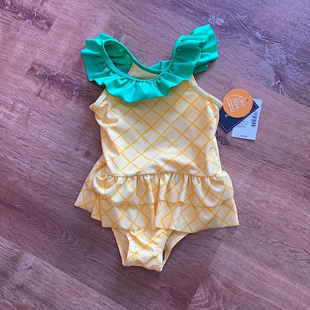 NWT Gymboree girl’s pineapple swim suit in size 2T.